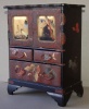 Vintage japanese lacquer jewelry box with bird, papillon and flower motifs on the top and round sideways.