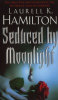 Hamilton, Laurell K.  : Seduced by moonlight