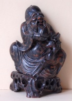 211.     An Immortal and a Deer. : Two-piece chinese carved soapstone figure. Cca 1900.