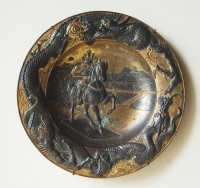 213.     Equestrian statue of a Shogun and                 landscape of Edo. : Dragon motifs on the edge of the plate.                Antique Japanese gilt bronze plate                in art nouveau style. Cca 1900-1920.