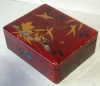 Vintage japanese lacquer box with bird and bamboo motif on the top. 