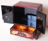 265.   Vintage japanese lacquer jewelry box with characteristic motifs on the top and round sideways.  : 