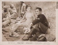 Ronald Colman és Rosalind Russell az Under Two Flags (Halálbrigád) c. filmben. [Original Stockphoto, 1936.]